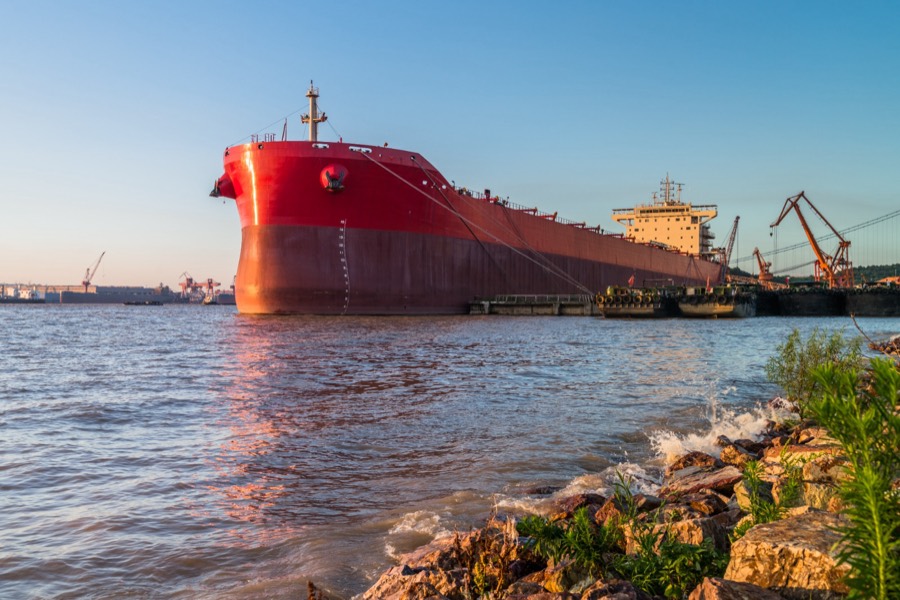 Bulk carrier alongside the berth under shore cranes